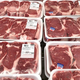Packages of red meat at a grocery store
